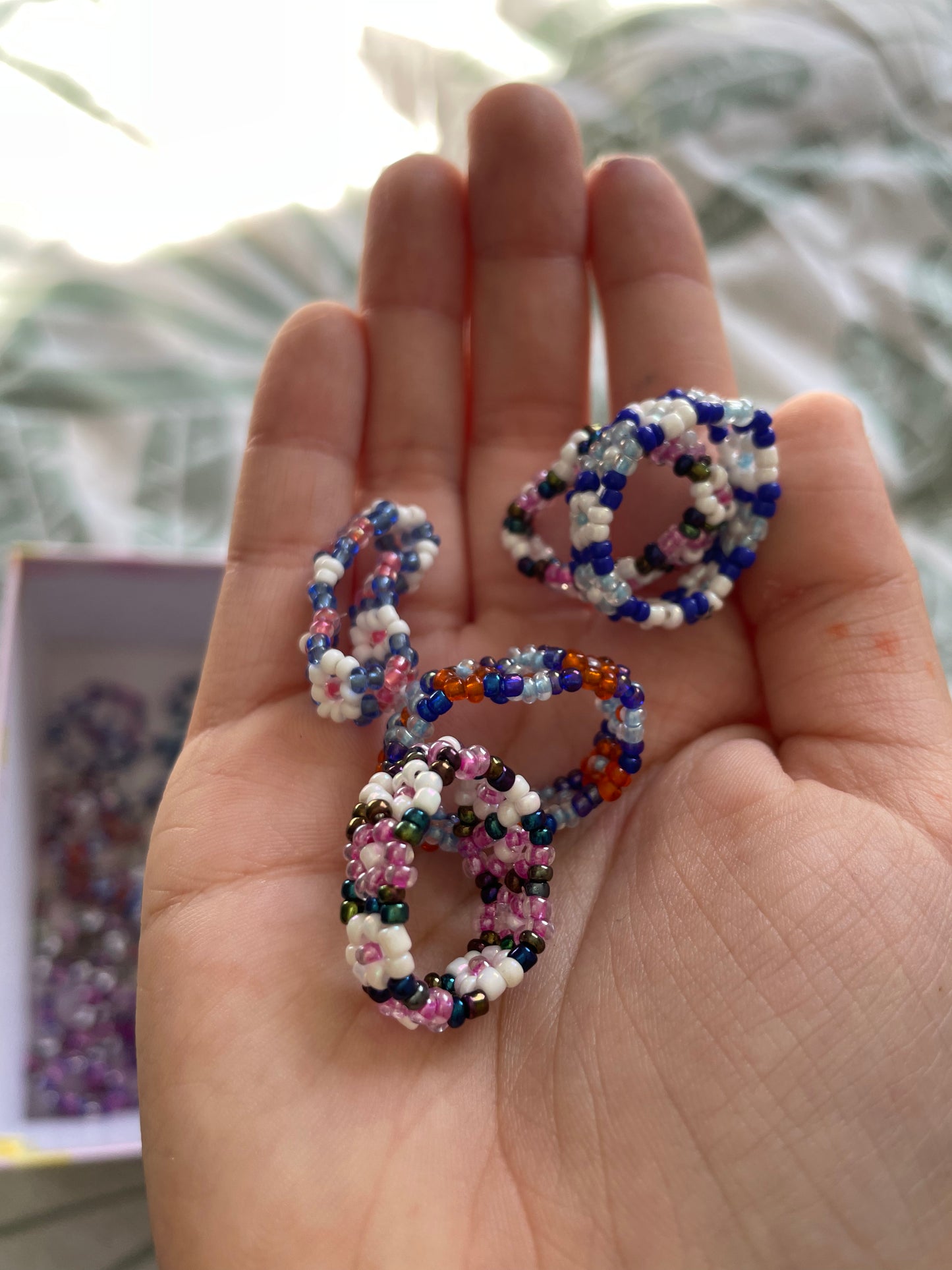 Tiny seed bead mystery pick rings